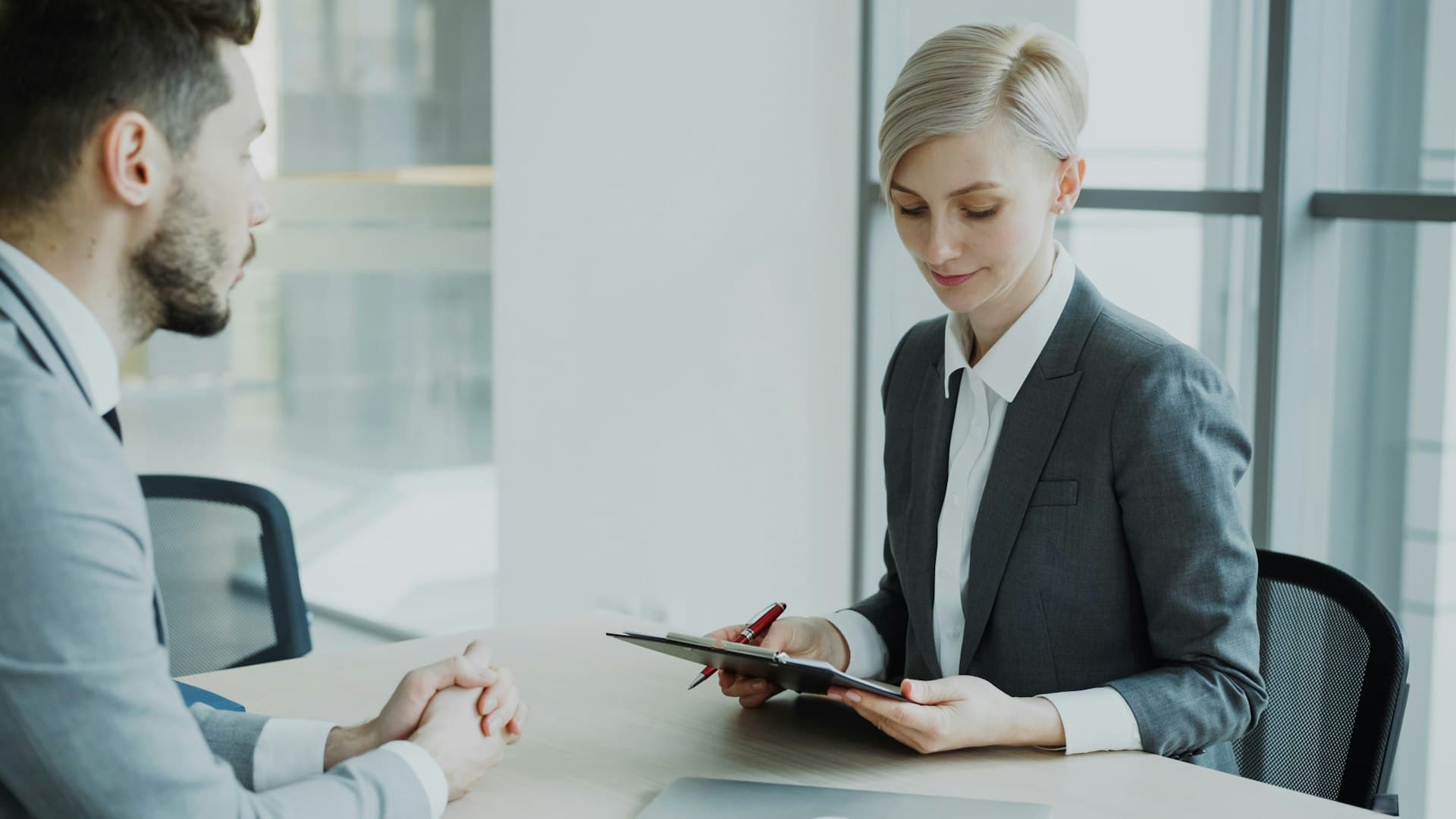 Two people reviewing an application document together