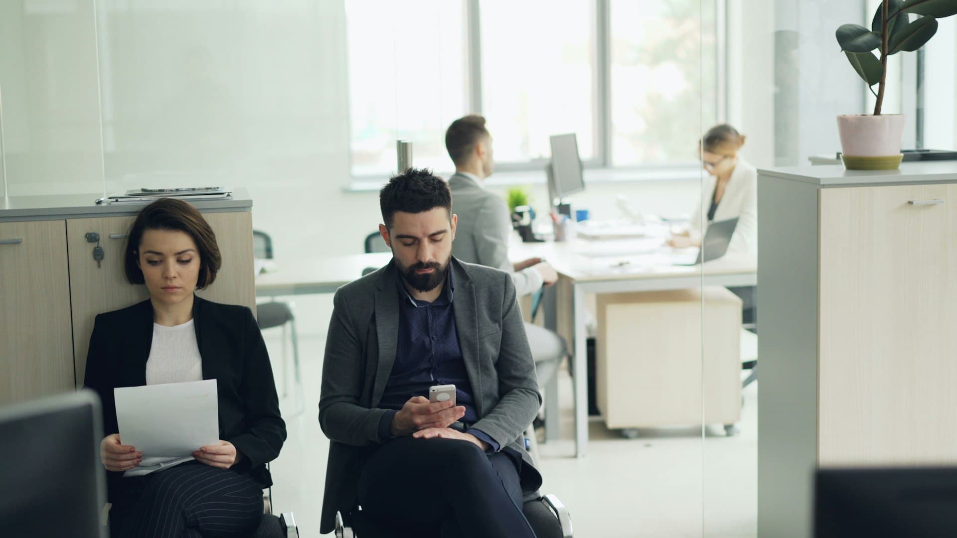 Candidates waiting in an office reception